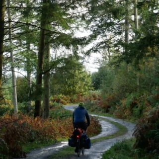 The best laid scheme o mice and men gang aft agley.
Earlier this year @wearecyclinguk launched a route called the Gallovidian Gravel that promised 300km of beautiful riding through Dumfries and Galloway on quiet lanes, trails and paths. @justin.mumford and I thought October would be a great month to give it a go.
The route was as lovely as we hoped, taking us through forest parks, down to the Solway coast and through historical but sleepy border towns. The weather was just as varied with short sharp showers mixed in with blue skies, sunshine and rainbows.
Our bikes were loaded with the usual camping gear but with the addition of packrafts. I'd spied a couple of lochs on the route so the Gallovidian Gravel became the Gallovidian paddle.
After climbing up into the rugged Galloway forest we inflated the boats and took to the waters of Loch Trool. Mirror calm and bathed in sunlight, it couldn't have been better. That day ended at the White Laggan Bothy for food, cider and cards.
But Burn's warning came to haunt us on the penultimate day when drizzle became persistent rain. Cold wet and tired, we skipped the last, planned paddle on Loch Ken. A shorter run into Dumfries was needed to keep all members of the group in good health. 
It didn't matter. We'd enjoyed some fine riding, a memorable paddle and had a long overdue brotherly catch up. Exactly what we wanted from the journey.

#gallovidiangravel #packrafting #cycletouring #whitelagganbothy #robbieburns